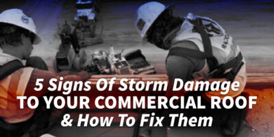 2 men looking at something on top of a flat roof with the caption 5 Signs Of Storm Damage To Your Commercial Roof & How To Fix Them