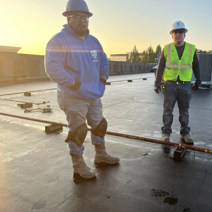 Crew members on roofing project